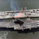 Illustration for article titled Celebrate the anachronism that is the center-island supercarrier